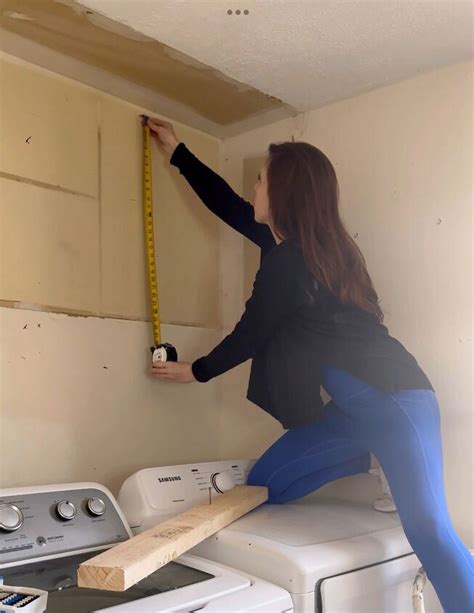 You Can Hang Cabinets By Yourself With This Easy Trick