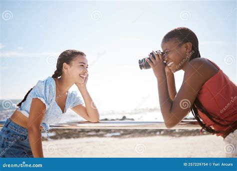 Summer Photographer And Friends At A Beach Having Fun And Posing For