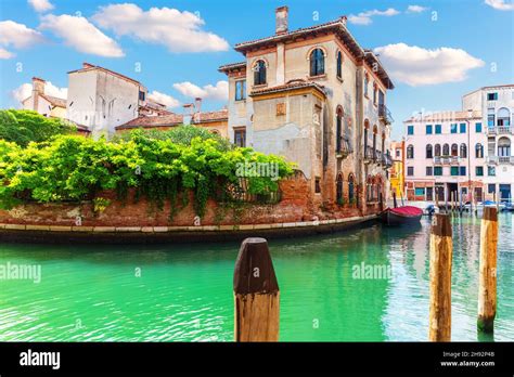 Medieval traditional palace in the canal of Venice, Italy Stock Photo ...