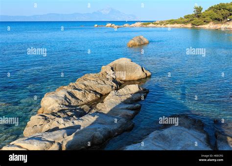 Aegean Sea Coast Landscape And Mount Athos In Mist View From Orange