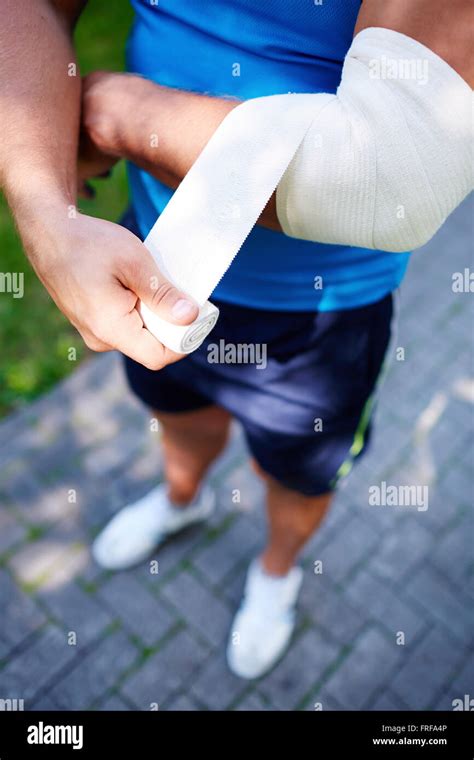 Bandaging Elbow Joint Stock Photo Alamy