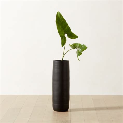 Black Stoneware Floor Vase Embodies A Classic Minimalist Aesthetic The