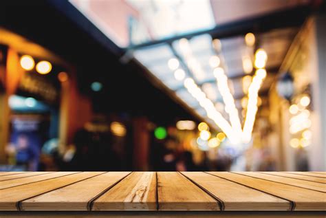 Empty Wooden Table Space And Front Of Abstract Blurred Background