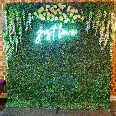 Wedding Backdrop with Green Wall and Neon Lights