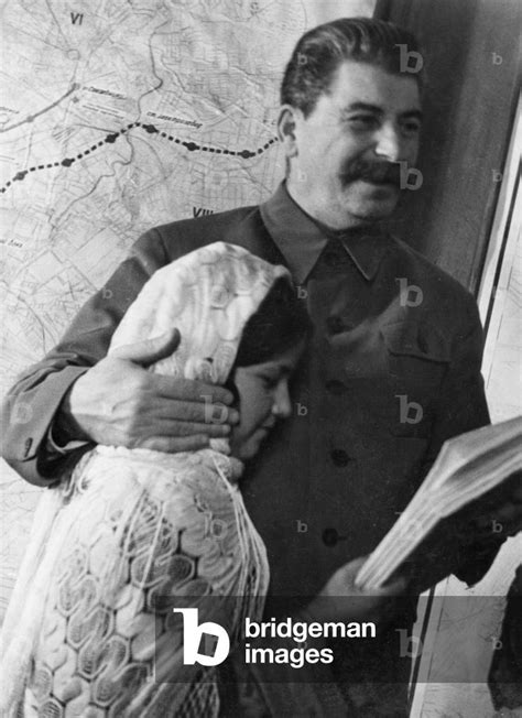 Propaganda Photo Of Josef Stalin As Benevolent Father Figure With Eleven Year Old Mamlakat