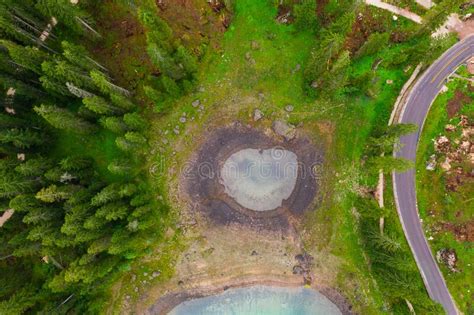 Aerial View Of Turquoise Blue Water Of Lake Carezza In Alps Dolomites