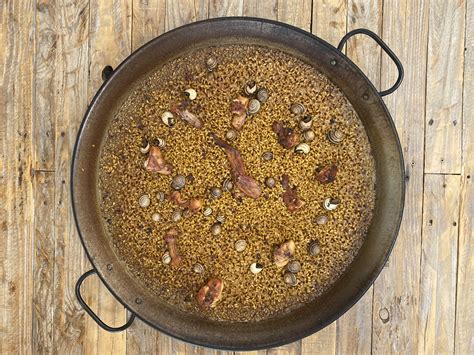 Arroz con conejo y caracoles al sarmiento Socarròs recetas de