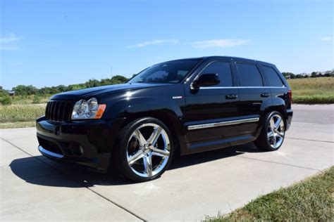 Black Jeep SRT8 AWD with 22" Rims