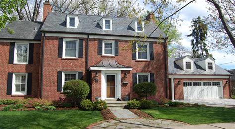 Brick Colonial House Gets A Garage Addition Normandy Remodeling