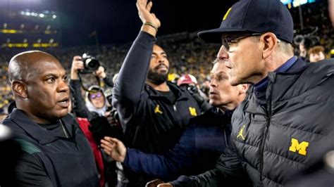 Michigan coach Harbaugh expects 4 Michigan State players to be charged for post-game fight | CBC ...