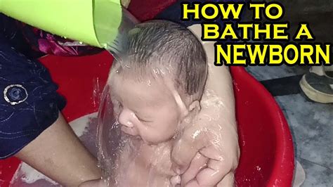 How To Bathe A Baby Bathing A Newborn Baby New Born Baby Bath