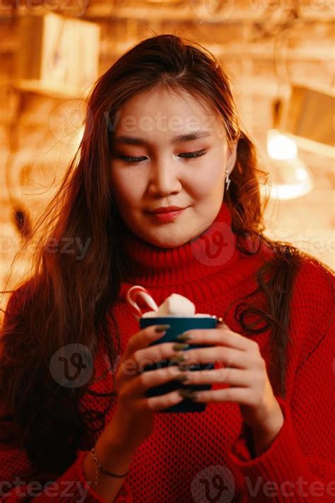 Asian Girl With Mug Of Hot Chocolate 14260746 Stock Photo At Vecteezy