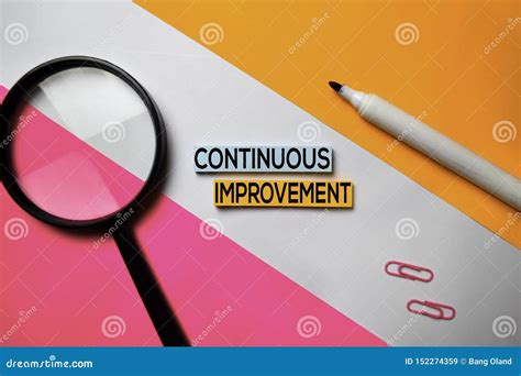 Continuous Improvement Text On Sticky Notes With Color Office Desk