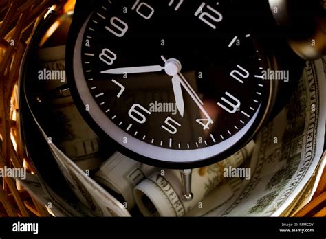 Clock And Money Precious Time Stock Photo Alamy