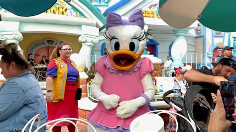 Photos Video Daisy Duck Greets Guests Dining At Caf Daisy In Mickey