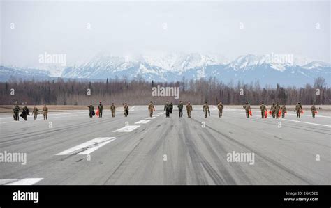 Airmen Assigned To The Rd Wing Conduct A Foreign Object Debris Walk On