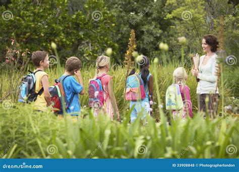 Teacher With Children On Field Trip Stock Photo Image Of Guidance