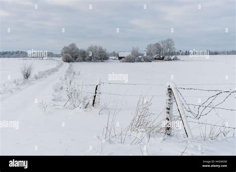 Snowy winter scene with an old farm house in the countryside Stock ...