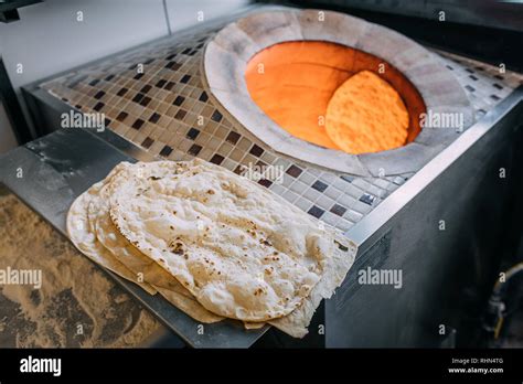 Traditional Turkish Wood Fired Stone Brick Oven And Pita Or Pide Bread