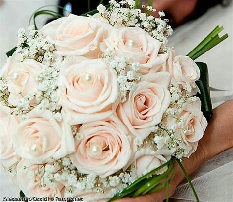 Ultra Romantic Wedding Bouquet Comprised Of Pastel Pink Roses White