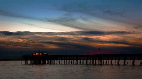 Balboa Pier Burnnung Sunset Photograph by Chris Brannen - Fine Art America