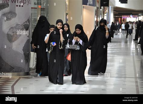 RIYADH, Saudi Arabia - Saudi women wearing the traditional ''abaya ...