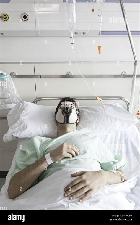 Patient infected with mask in hospital, sick Stock Photo - Alamy