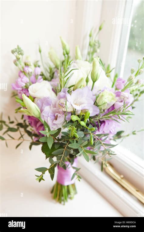 Wedding Flowers White Lilac Rose And Freesia Bouquet Stock Photo