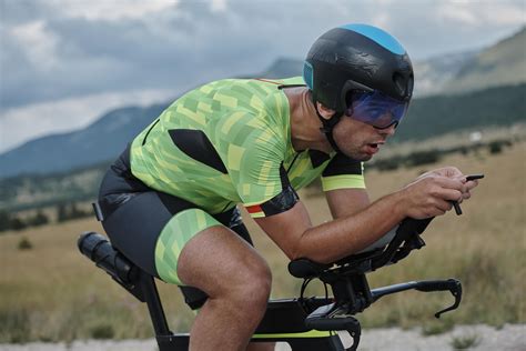 triathlon athlete riding bike 11635750 Stock Photo at Vecteezy