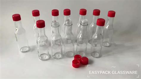 Oz Clear Glass Woozy Bottles For Hot Sauce With Red Caps Shrink Bands