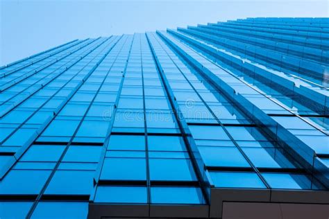 Modern Glass Facade Of An Office Building View From Below Stock Image Image Of District