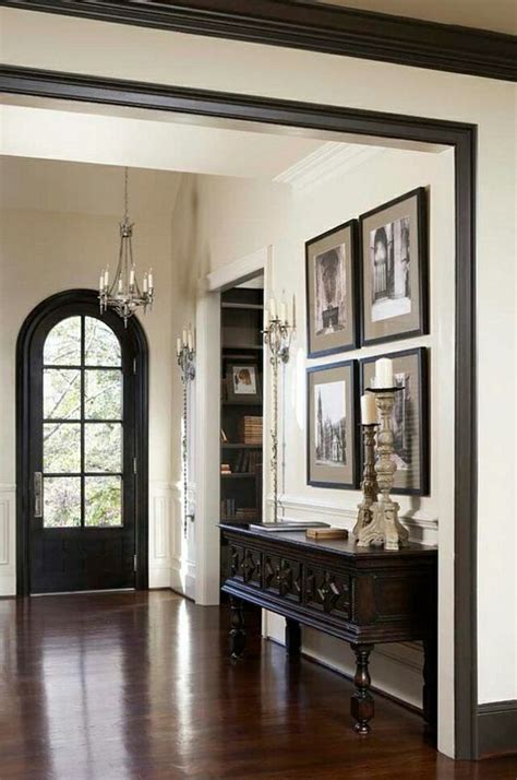 Pin by Janet Crock on Entry Interior | Dark trim, White walls, White ...