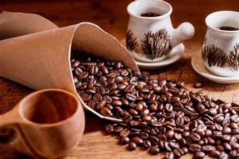 Still Life With Coffee Beans And Coffee Cups Filled Coffee Stock Photo