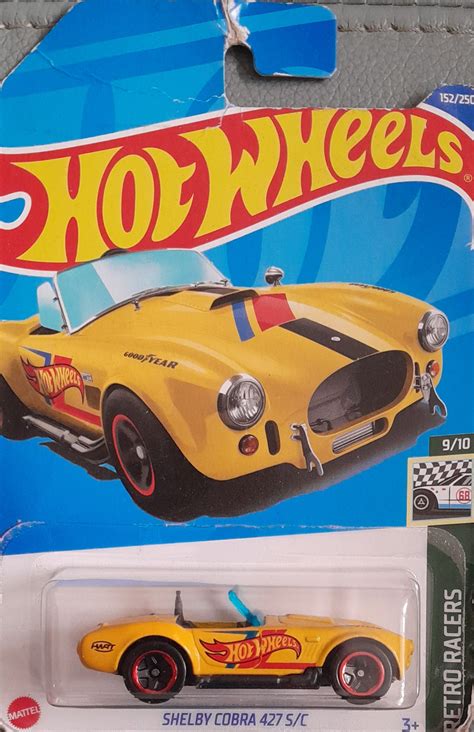 Embalagem Danificada Hot Wheels Retro Racers Shelby Cobra 427 S C