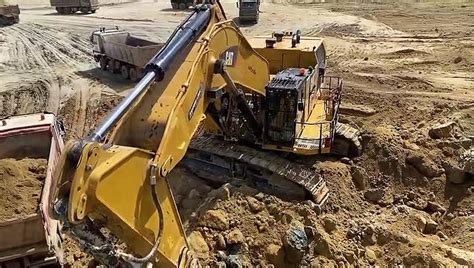 Caterpillar 6015B Excavator Loading Mercedes MAN Trucks Sotiriadis