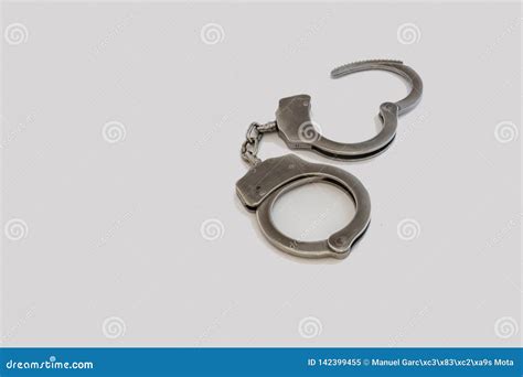 A Metal handcuffs stock image. Image of lock, concept - 142399455