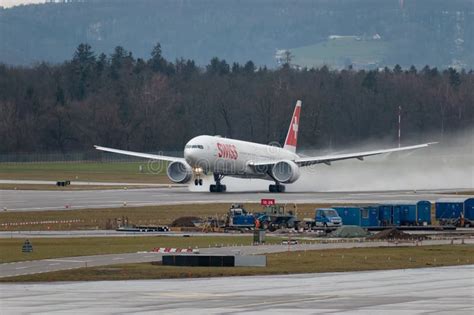 HB JNJ Swiss Boeing 777 3DEER Jet In Zurich In Switzerland Editorial