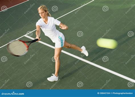 Tennis Player Swinging Racket In Forehand Motion Stock Photo Image Of