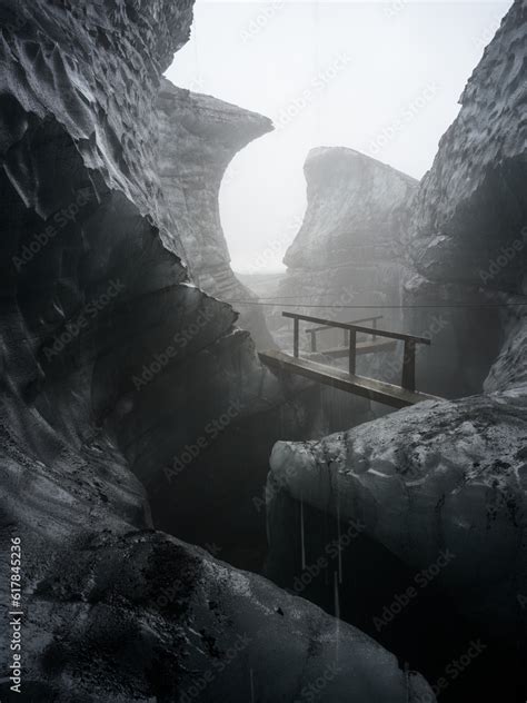 By the entrance of Katla Ice Cave, Mýrdalsjökull Glacier, South Iceland ...