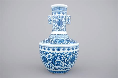 A Chinese Blue And White Ming Style Porcelain Arrow Vase With Lotus