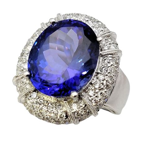 Large Oval Tanzanite And Pave Diamond Halo 18 Karat White Gold Cocktail Ring For Sale At 1stdibs