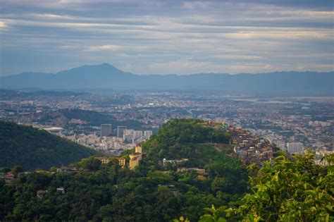 Premium Photo | Aerial view of the favelas and the city of rio de janeiro