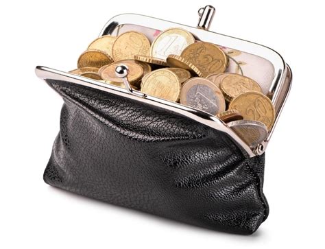 Premium Photo | Black wallet with coins