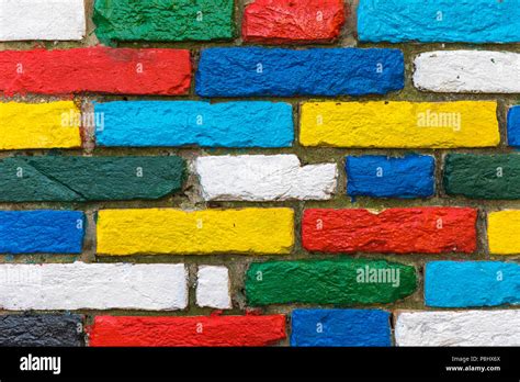 Colorful brick wall background. Rainbow colourful brick wall. Colorful ...