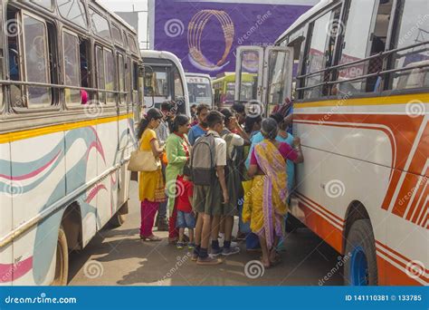 People Stand In Line At The Multi Colored Bus At The Indian Bus Station