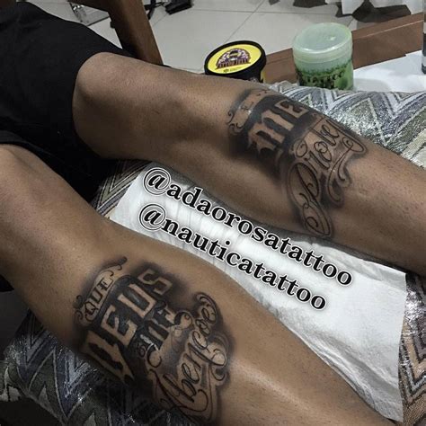 Matching tattoo on Neymar's shins that reads "Que deus