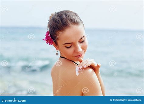 Woman Applying Sunscreen Creme On Tanned Shoulder Skincare Body Sun