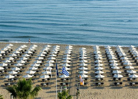 AQUILA PORTO RETHYMNO HOTEL - BEACH TERRACE VIEW - Aquila Hotels & Resorts