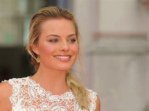 Margot Robbie Actress Blonde Lying On Back Legs Looking At Viewer