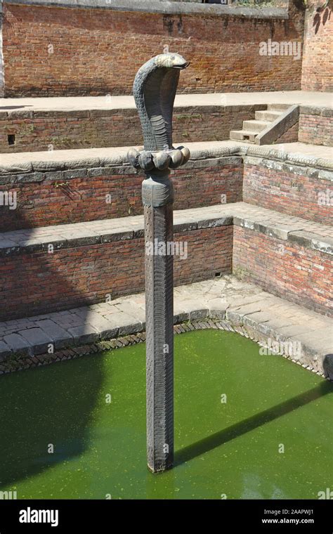 tall thin sculpture of the naga Stock Photo - Alamy